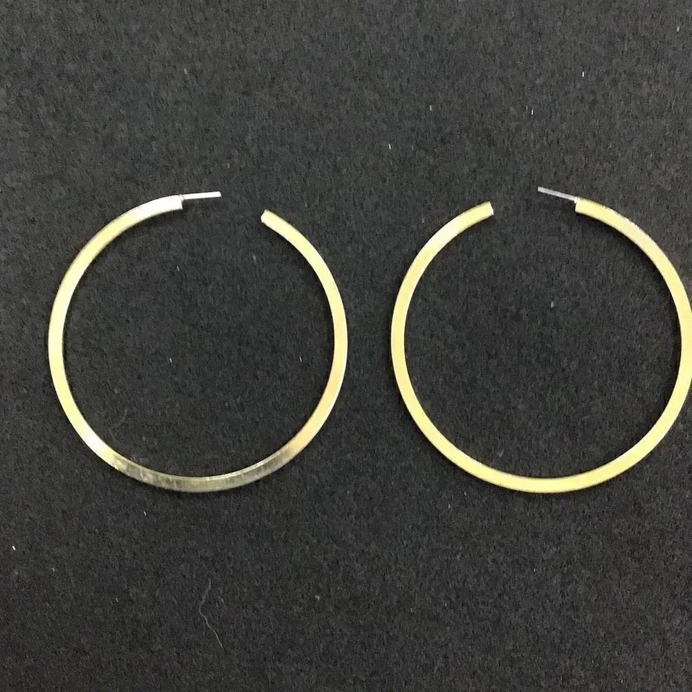 Ear rings, classic favorite gold-tone hoops Two and three-quarter inch from esta
